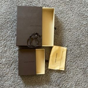 2 Louis Vuitton boxes with small dust bag and leather cord.
